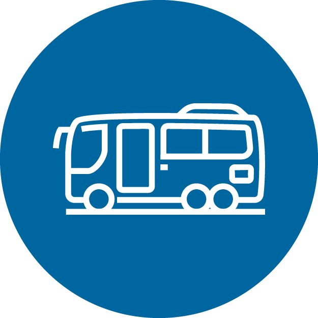 An icon of a motorhome in a blue circle.