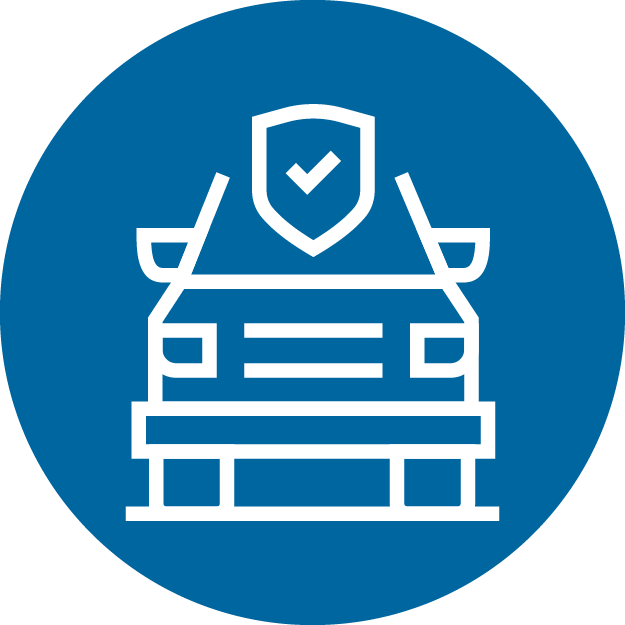 An icon of a car with shield in a blue circle.